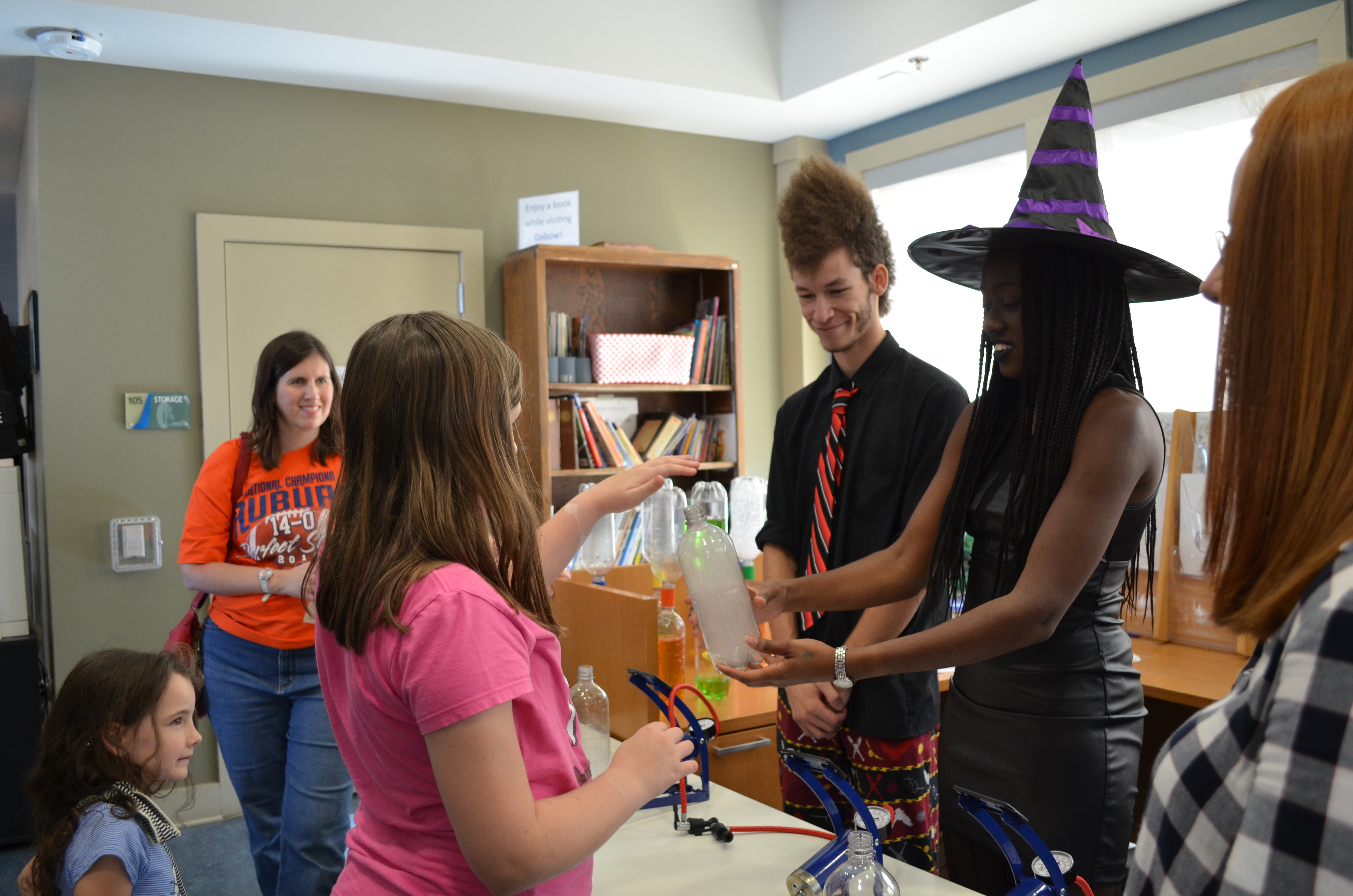 Group of people creating a science experiment