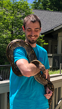 Man holding snake