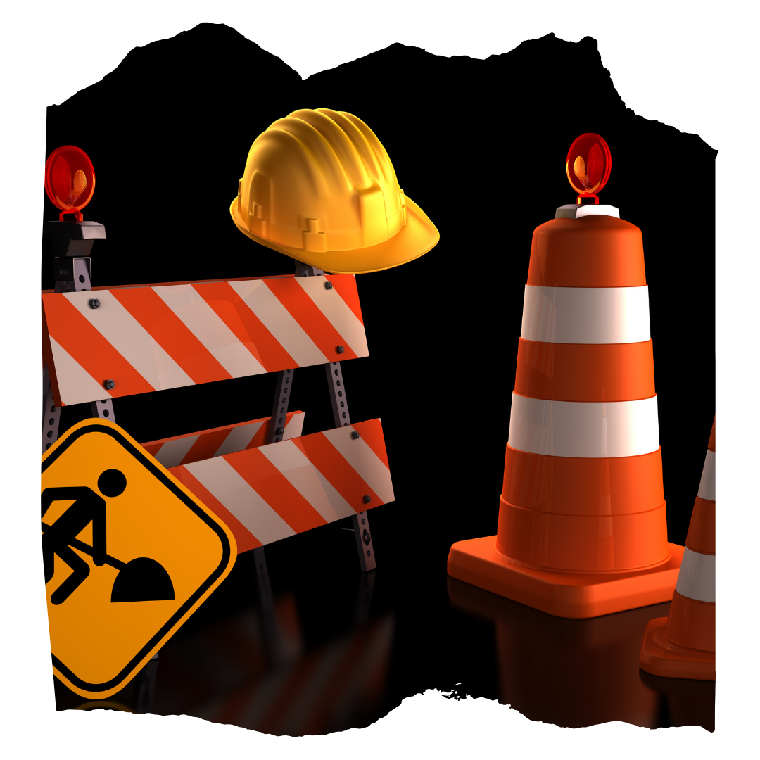 Construction barricade, traffic cones, warning lights, and a yellow hard hat.”