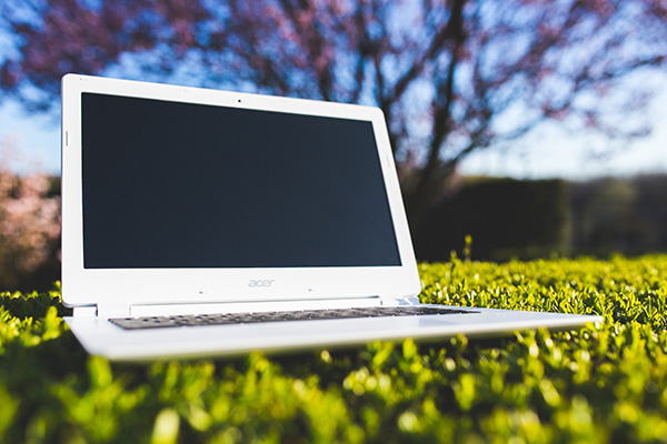 a laptop on grass