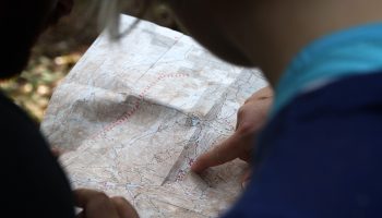 a person pointing at a map